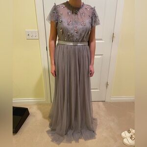 Brand new needle and thread gown in grey, size 10, with tags.